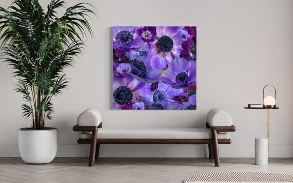 A painting of purple flowers in the center.